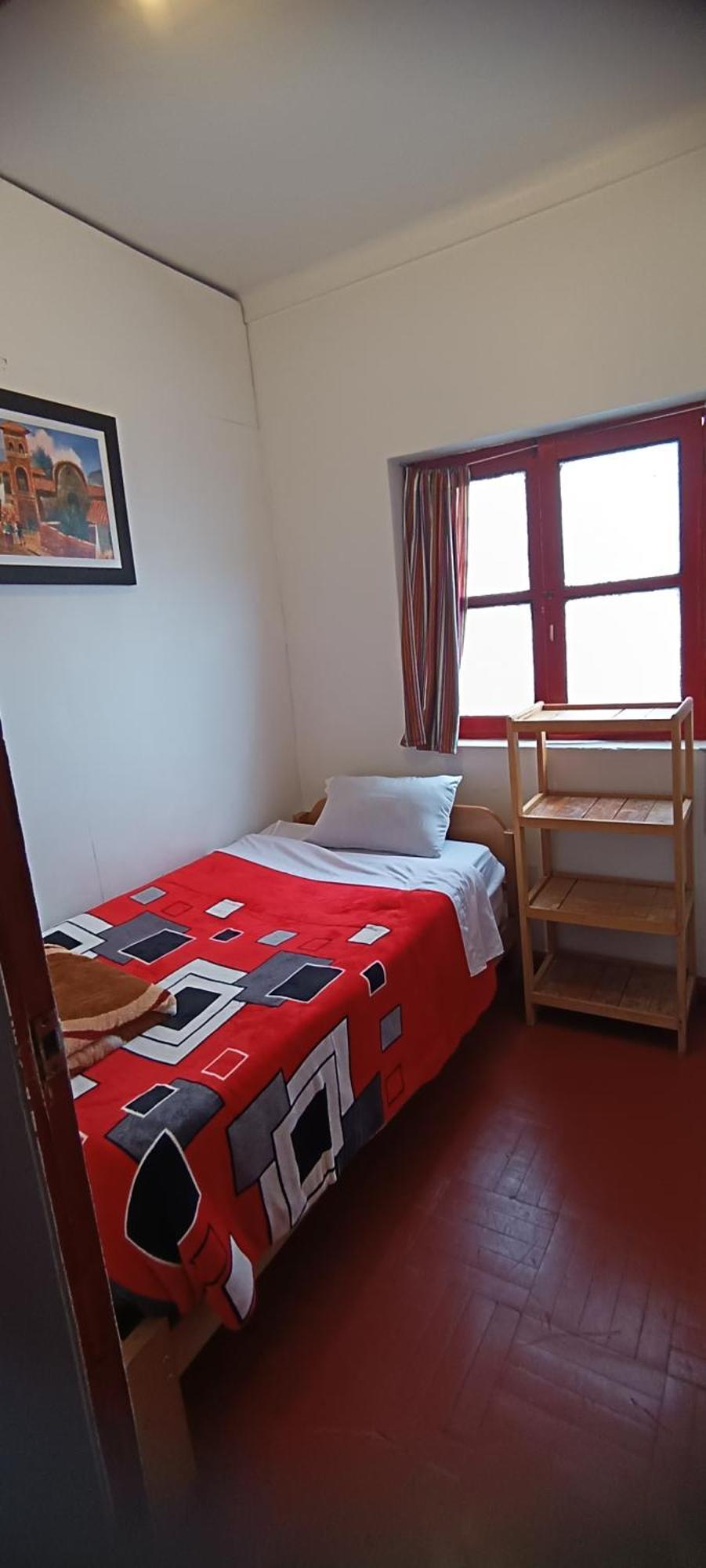 Sk Hostal Cuzco Habitación foto