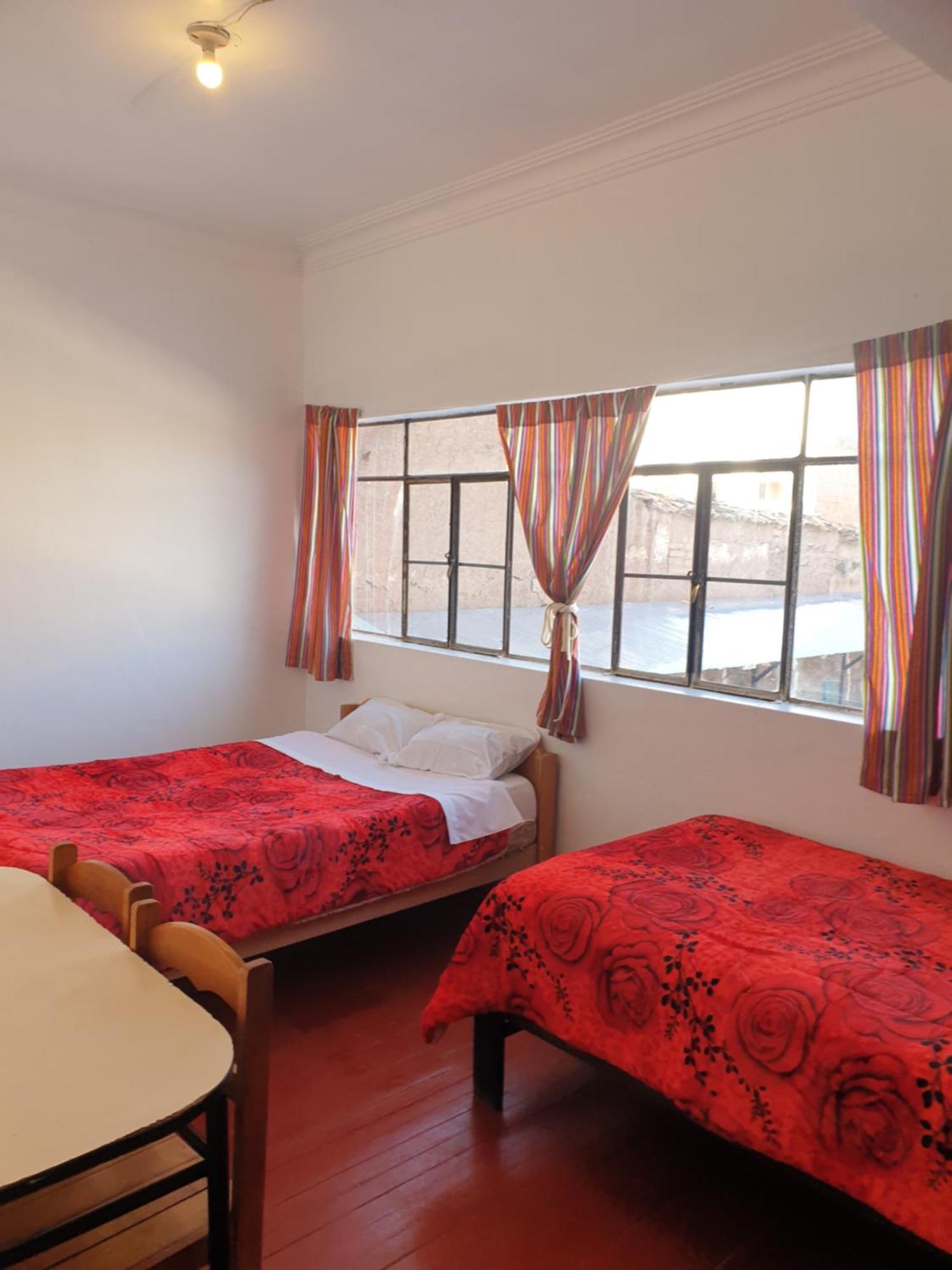 Sk Hostal Cuzco Habitación foto